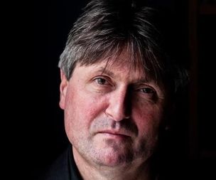 Poet laureate Simon Armitage reads work at Belper Library in live stre